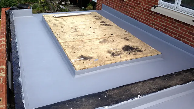 Flat asphalt roof work done by our team
