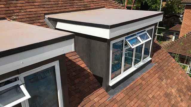 Flat roof work above windows in Staines